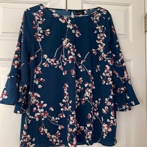 Lane Bryant blouse. Easy wear out of the dryer. Pretty ruffle detail on sleeve.